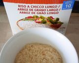 Foto del paso 8 de la receta: Calamares de Potera en su Tinta con Arroz Blanco de Grano Largo