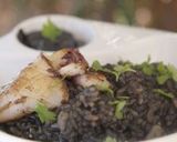 A picture of step 8 of Creamy black rice with squid and olive oil recipe.