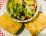 A picture of step 1 of Roti serve with green salad.