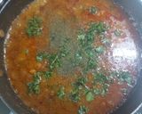 A picture of step 4 of Kabuli chana with poory achar.