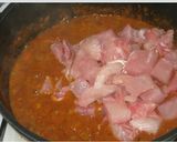 A picture of step 5 of Coconut fish curry.