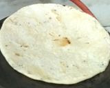 A picture of step 2 of White sorghum chapati on clay tawa.