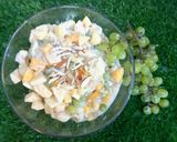 A picture of step 4 of Yogurt fruit chat including banana 🍌 apple 🍎 peaches 🍑.