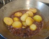 A picture of step 7 of Niramish Aloo Dum.