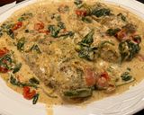A picture of step 7 of Tuscan Chicken.