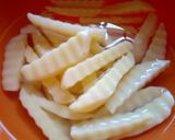 A picture of step 3 of #THE BIG FIVE#KIDS MENU Kuku Kikapu with Curly Chips.
