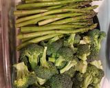 A picture of step 1 of Delicious cheesy baked broccoli & asparagus.