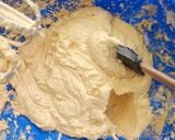 A picture of step 7 of Spongy passion cupcakes.