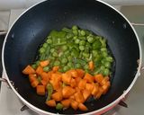 A picture of step 4 of Vegetable Paneer korma in white gravy.