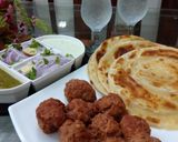A picture of step 7 of Gola kabab & lachcha Paratha with cold drink.
