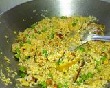 A picture of step 6 of Masala potato rice.