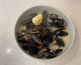 A picture of step 3 of Mussels in a white wine, butter, garlic and parsley sauce.