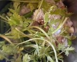 A picture of step 2 of Malvani Chicken Hirva Masala.