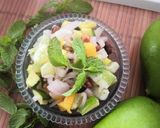 A picture of step 2 of Khatta meetha aam salad.