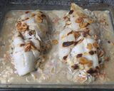 Foto del paso 7 de la receta: Merluza rellena al horno