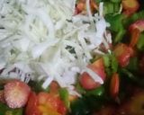 A picture of step 7 of Spicy BBQ chicken ricewith stir fry vegetables.