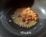 A picture of step 2 of Raw Mango Rice.