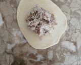 A picture of step 5 of Sardine Empanadas with Tomato and Onion Sauce.