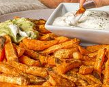 Foto del paso 2 de la receta Batatas "fritas" con salsa de yogur y mostaza