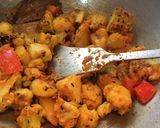 A picture of step 3 of Gobhi Matar Curry.