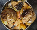 A picture of step 9 of Maharashtrian Bharli Vangi in Pressure Cooker.
