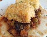 Foto del paso 6 de la receta Caponata siciliana con bacalao empanado sobre pan Naan
