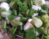 A picture of step 1 of Spring onion pakoda.