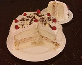 A picture of step 34 of White Layer Cake with a Raspberry Swirl Cheesecake center layer and a Raspberry Cream Frosting.