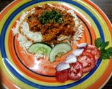 A picture of step 4 of Masala scrambled eggs with cumin rice.