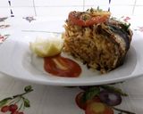 Foto del paso 6 de la receta: Las sardinas con arroz al horno