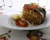 Foto del paso 6 de la receta: Las sardinas con arroz al horno