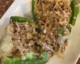 A picture of step 6 of Shaved beef stuff pepper with white Queso cheese.