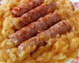 A picture of step 1 of Sausages In Apple & Onion Sauce.