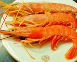 Foto del paso 3 de la receta Revuelto de ajetes, setas variadas y gambas