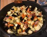 Une image de l'étape 11 de Aubergines, carottes et ciboules au lard et curry.