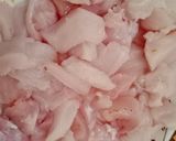 A picture of step 6 of Tandoori chicken rolls up.