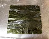 A picture of step 4 of Mickey Mouse Roll Sushi.