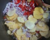 A picture of step 2 of Potato with spring onion.