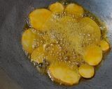 A picture of step 2 of Potato in Mustard Gravy.