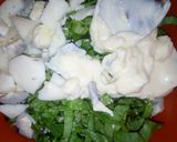 A picture of step 14 of Egg and parsley fried rice.