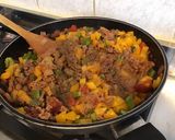 Une image de l'étape 10 de Bœuf aux poivrons bicolores,tomates,herbes et épices.