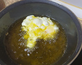 Foto del paso 3 de la receta: Huevos rotos con pico de gallo