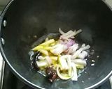 A picture of step 2 of Aloo posto.