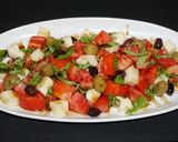 A picture of step 3 of Mozzarella Cheese with Tomatoes and Balsamic Dressing.