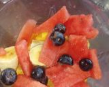 A picture of step 3 of Mango grapes melon and banana smoothie.
