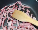 Foto del paso 4 de la receta: Coles de Bruselas al horno con bacon, uvas pasas y feta
