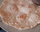 A picture of step 4 of Roti Roll with Cheese Spread.