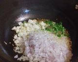 A picture of step 2 of Onion fried rice.