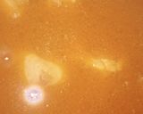 A picture of step 8 of Aloo chicken.