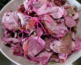A picture of step 1 of Red Amaranth Dry Curry.
